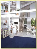 Some apartments have two-story living rooms.